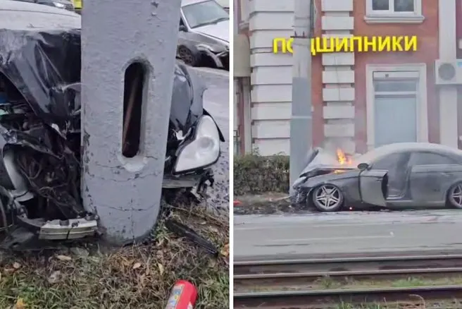 В Омске Мерседес столкнулся с другой машиной и врезался в столб, после чего загорелся. На месте работают пожарные и медицинские службы; водитель остался жив.